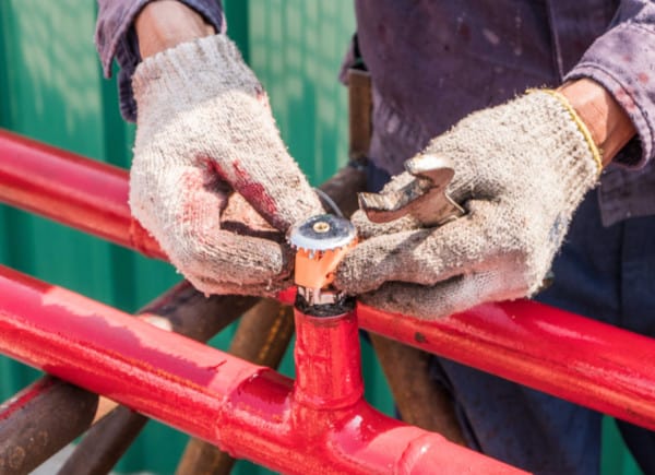 Picture of Contractor Installing a Fire Sprinkler